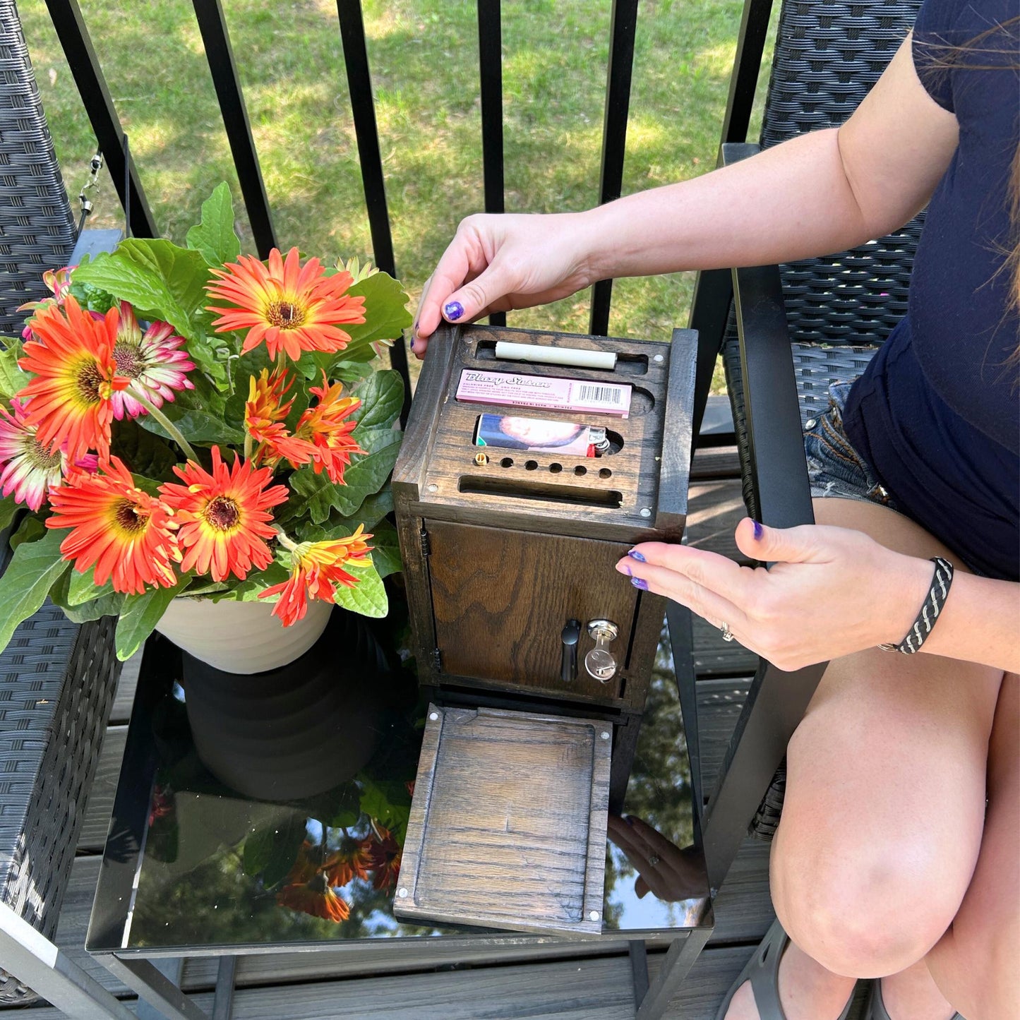 Portable Mini Stash Box with top lid that flips into a rolling tray, perfect for herbs and accessories.