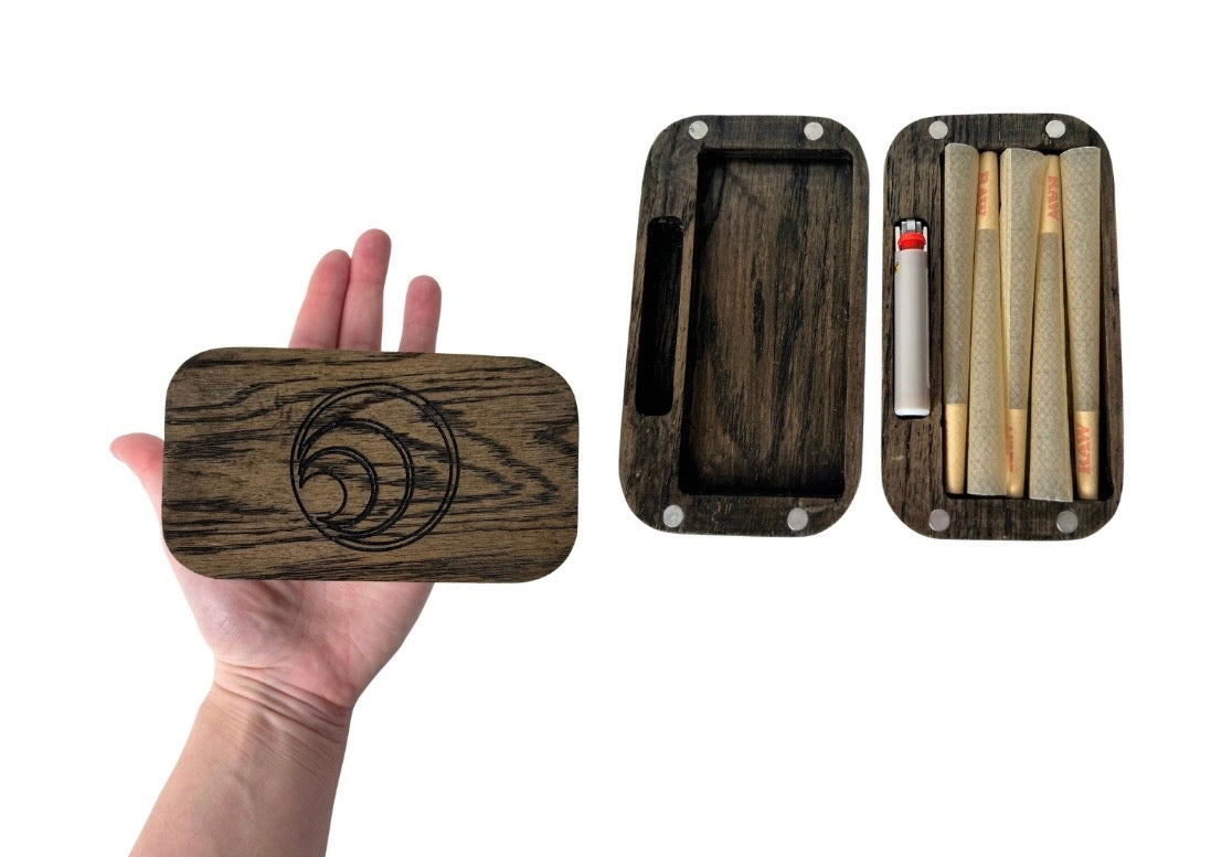 Wooden case with a logo, divided into compartments with smoking accessories on a white background