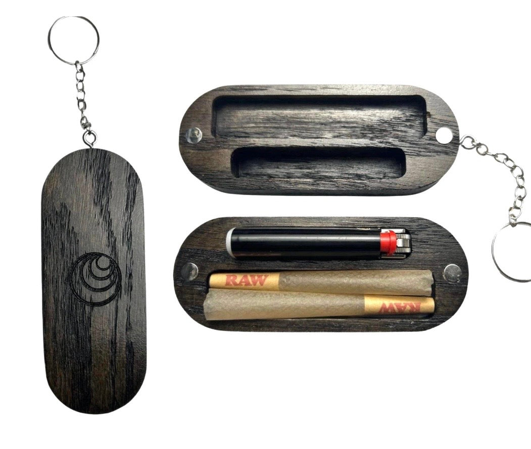 Set of wooden smoking accessories including a case with a lighter and cigarettes on a white background.