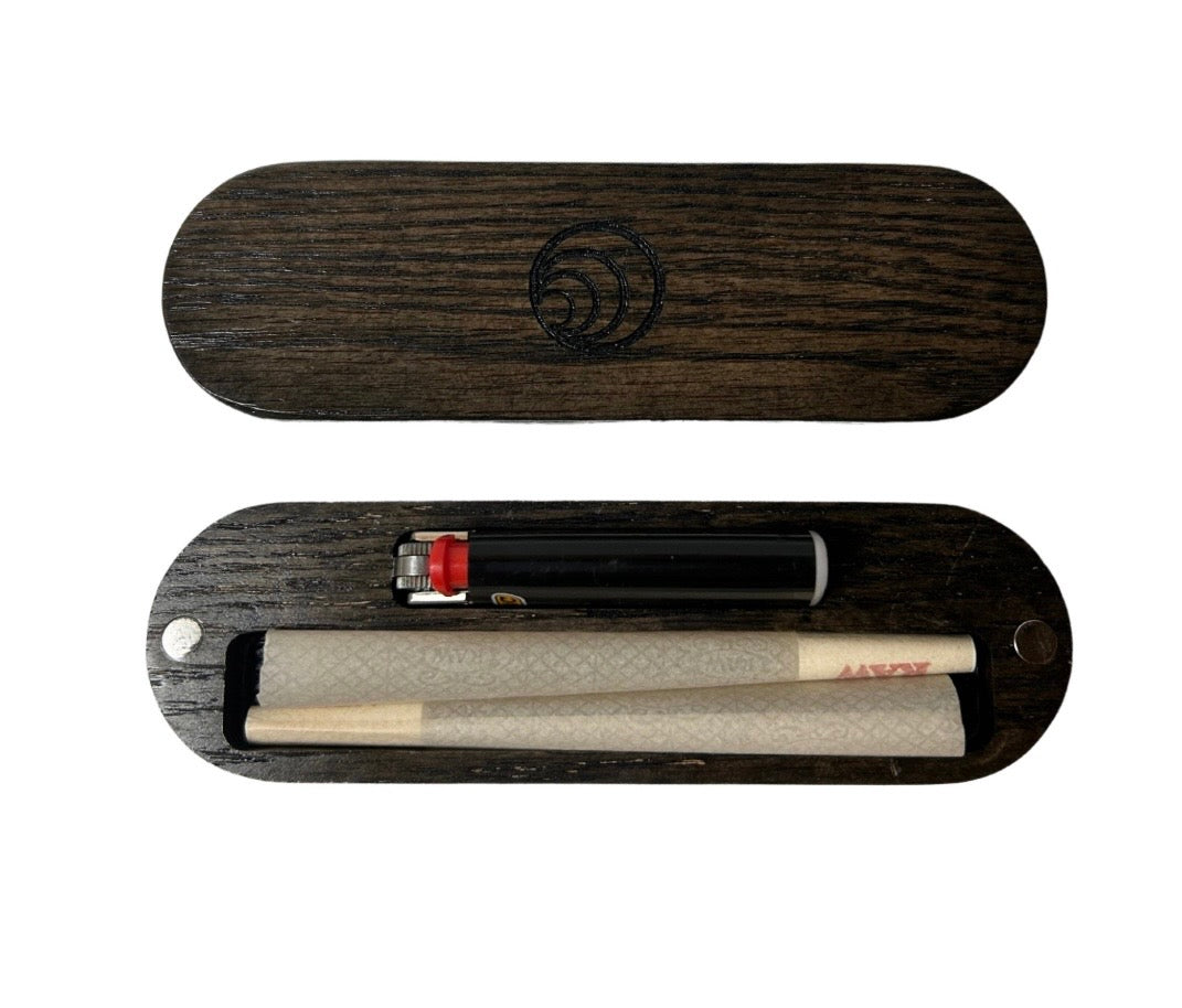 Wooden rolling kit with a roller and paper in an open case on a white background