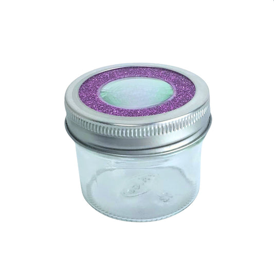 A vibrant boho purple magnifying stash jar, perfect for displaying and organizing herbs with style.