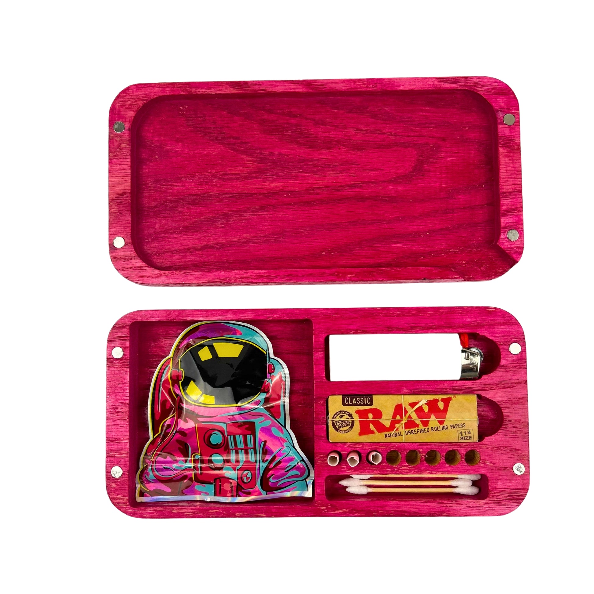A pink rolling tray with lid, containing a colorful space-themed rolling paper, lighter, and tools, with the RAW logo on the paper.