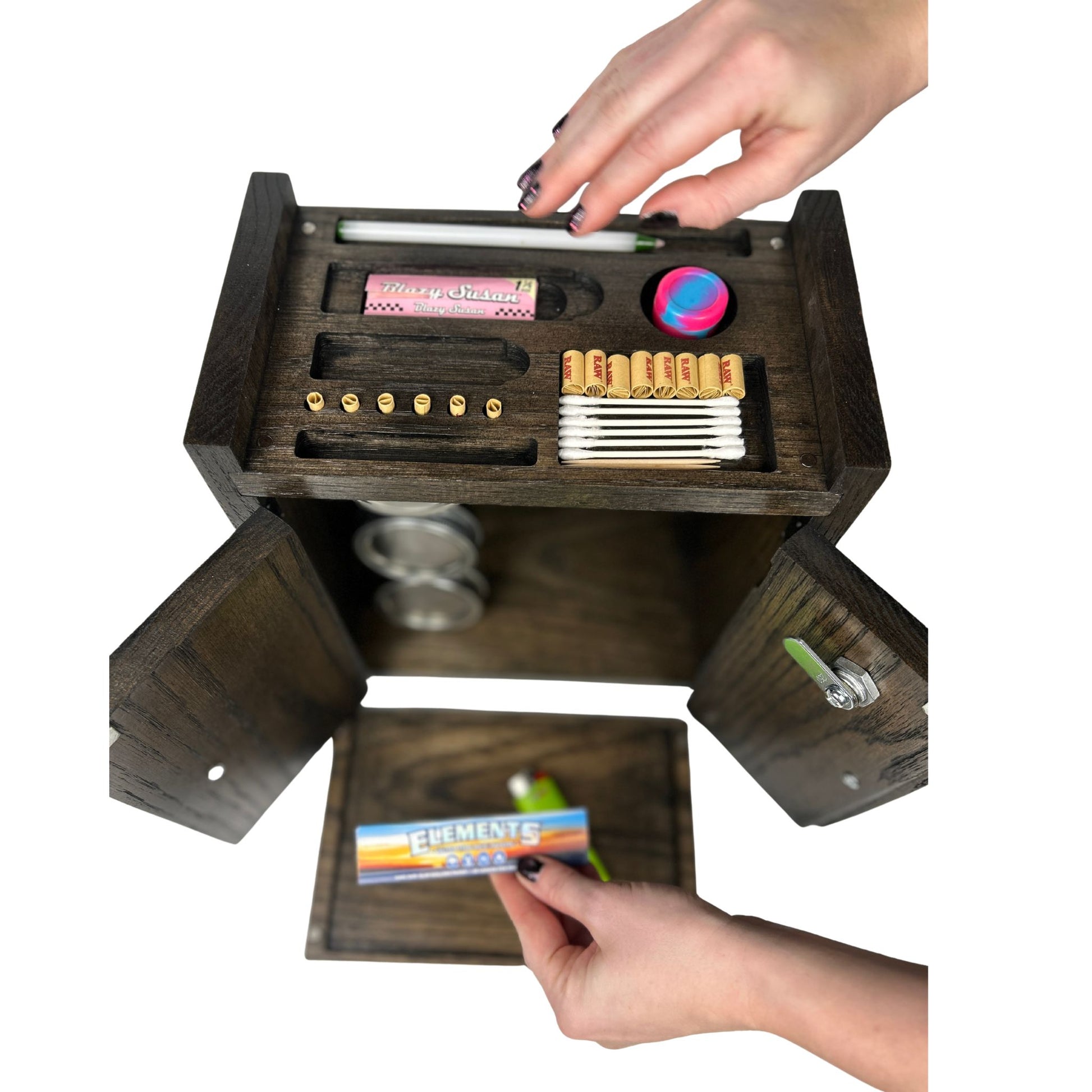 Wooden cabinet lockable stash box with slots for tools, a key, and a colorful silicone jar on a white background