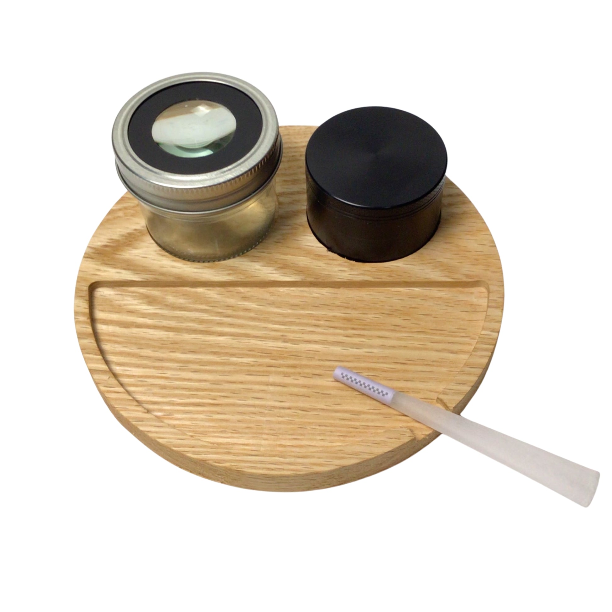 rolling tray that looks like a smiley face. Comes with a magnifying jar an holds a herb grinder