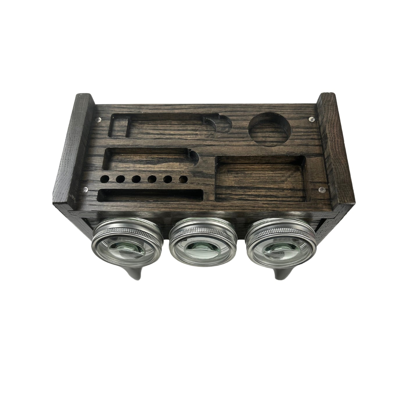 Hidden Storage Compartment: The Un Stash Box with the lid removed, revealing a hidden storage compartment for additional accessories like rolling papers, tips, and lighters.